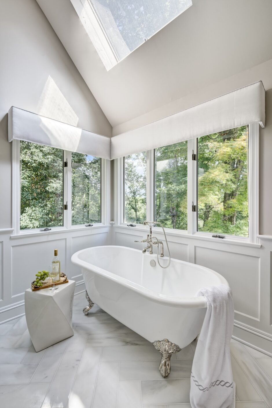 Bathtub Below Skylight Primary Bathroom Design